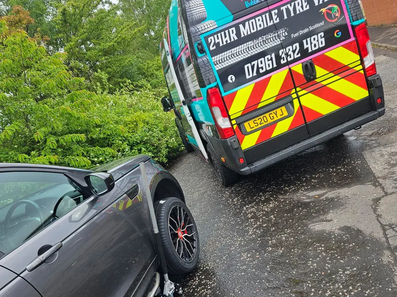 Fuel Drain Scotland mobile tyre van attending a car with a flat tyre.